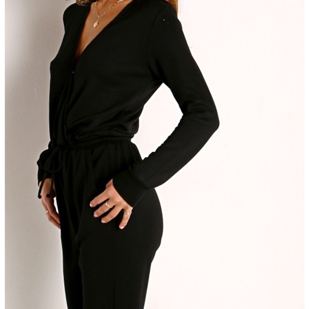 Beyond Yoga Black fleece Jumpsuit. XS nwot